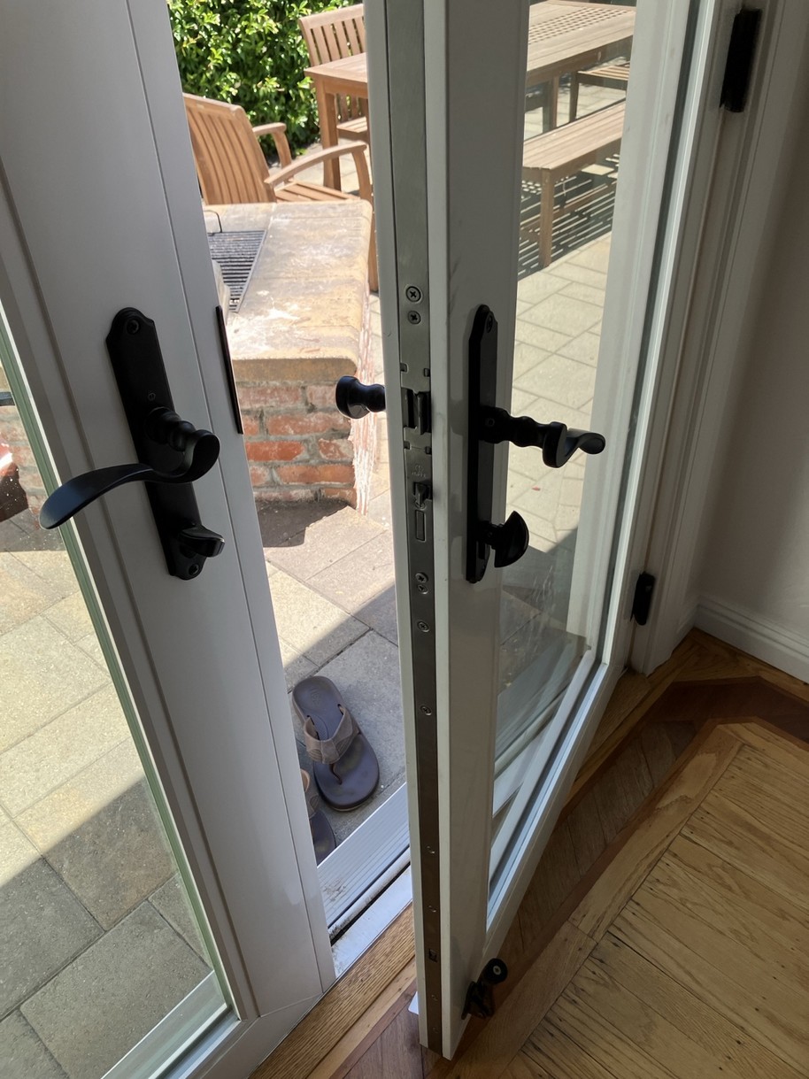 Removed multipoint door lock gearbox and center case prepared for replacement matching